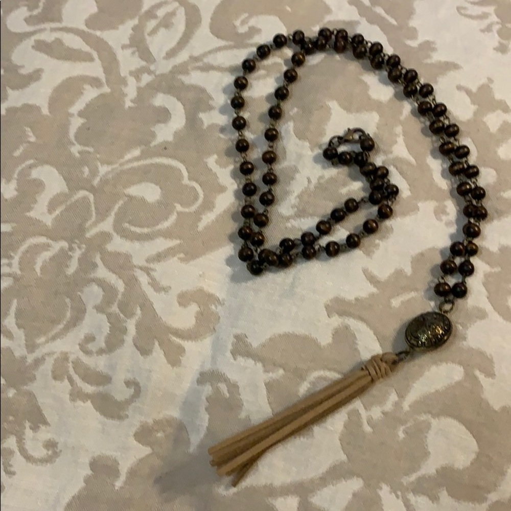Boutique Tortoise bead leather tassel necklace